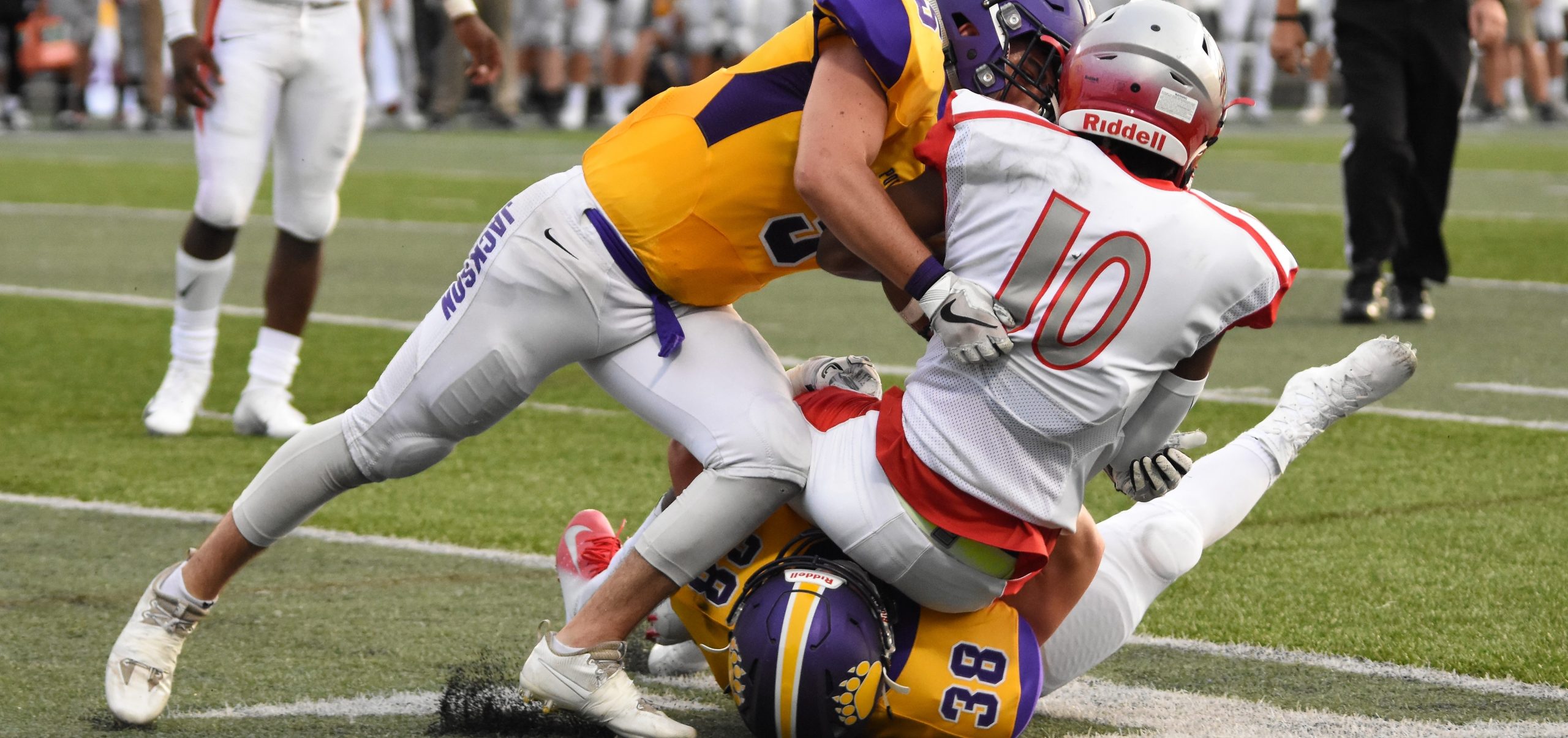 Beatrice Society - Football players tackling