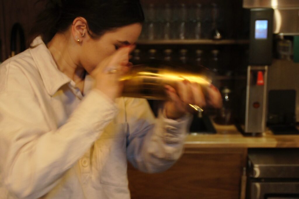 Jessica Rodrigues making cocktails at the Beatrice Society Cafe